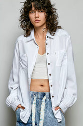 Model wearing a white washed textured cotton western button-front shirt by POL from Simmer & Fay, POL