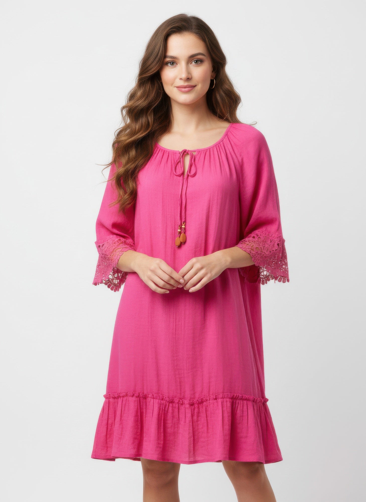 Simmer & Fay — model wearing Mlle Gabrielle Cabaret pink solid elbow sleeve dress with crochet cuff detail and tie neckline