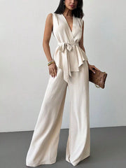 Simmer & Fay sleeveless wrap top and wide-leg pants set in cream white with tie waist and flowy silhouette